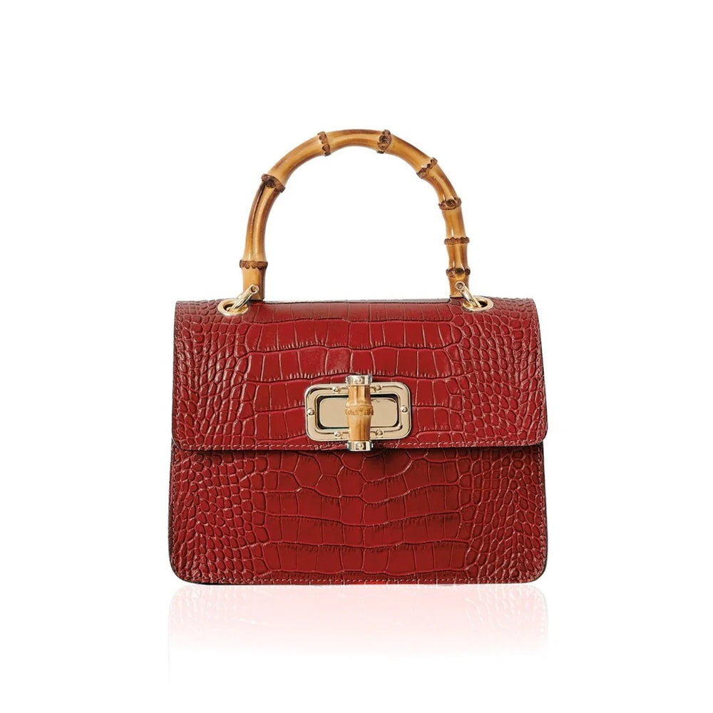 Italian croc-embossed leather bag with curved bamboo handle in dark red with gold turn-lock clasp