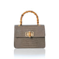 Italian croc-embossed leather bag with curved bamboo handle in dark taupe with gold turn-lock clasp
