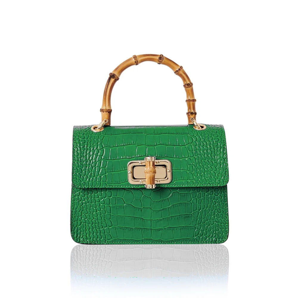 Italian croc-embossed leather bag with curved bamboo handle in green with gold turn-lock clasp