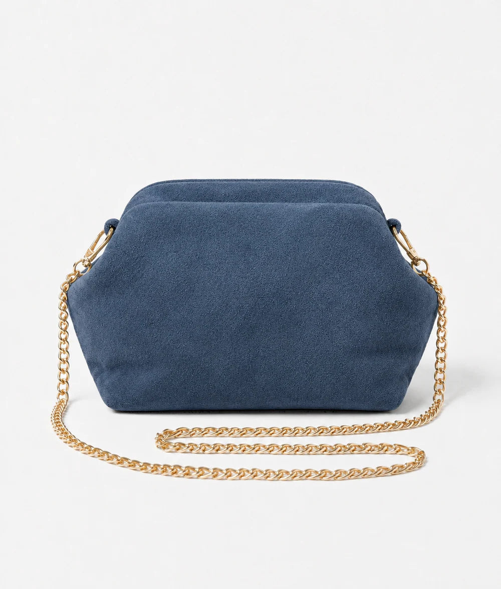 Denim blue: Italian handmade suede shell-inspired chain bag in denim blue with gold chain strap
