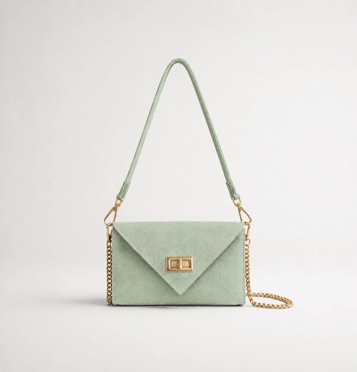Sage green: Italian handmade suede occasion bag in sage green with gold chain strap and turn-lock clasp