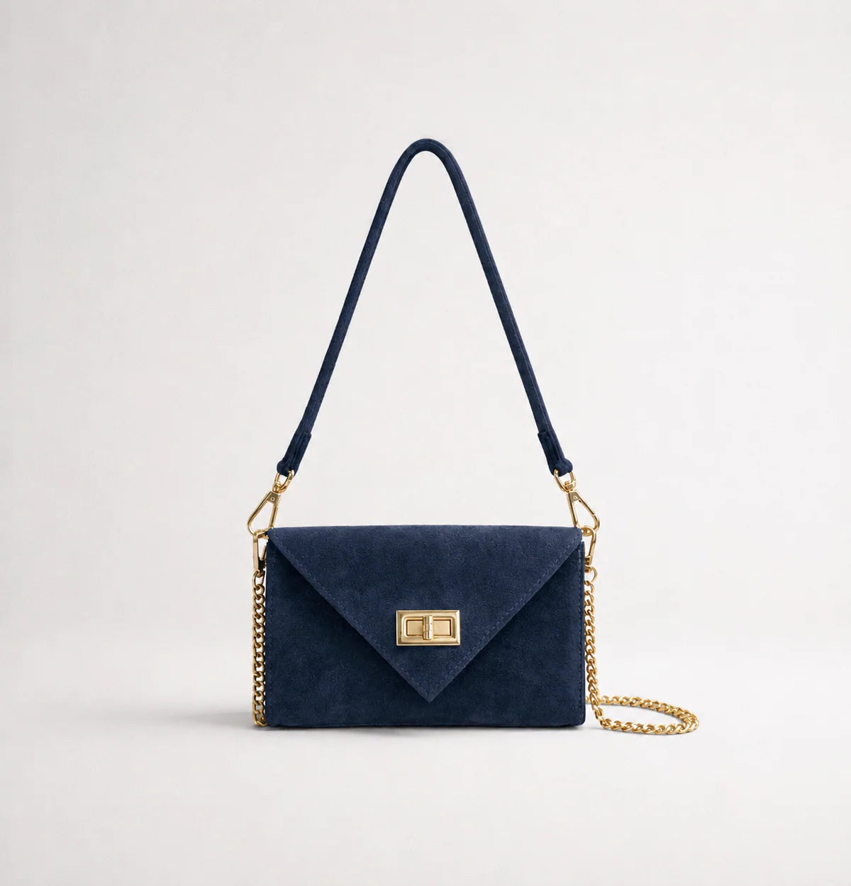 Navy: Italian handmade suede occasion bag in navy with gold chain strap and turn-lock clasp