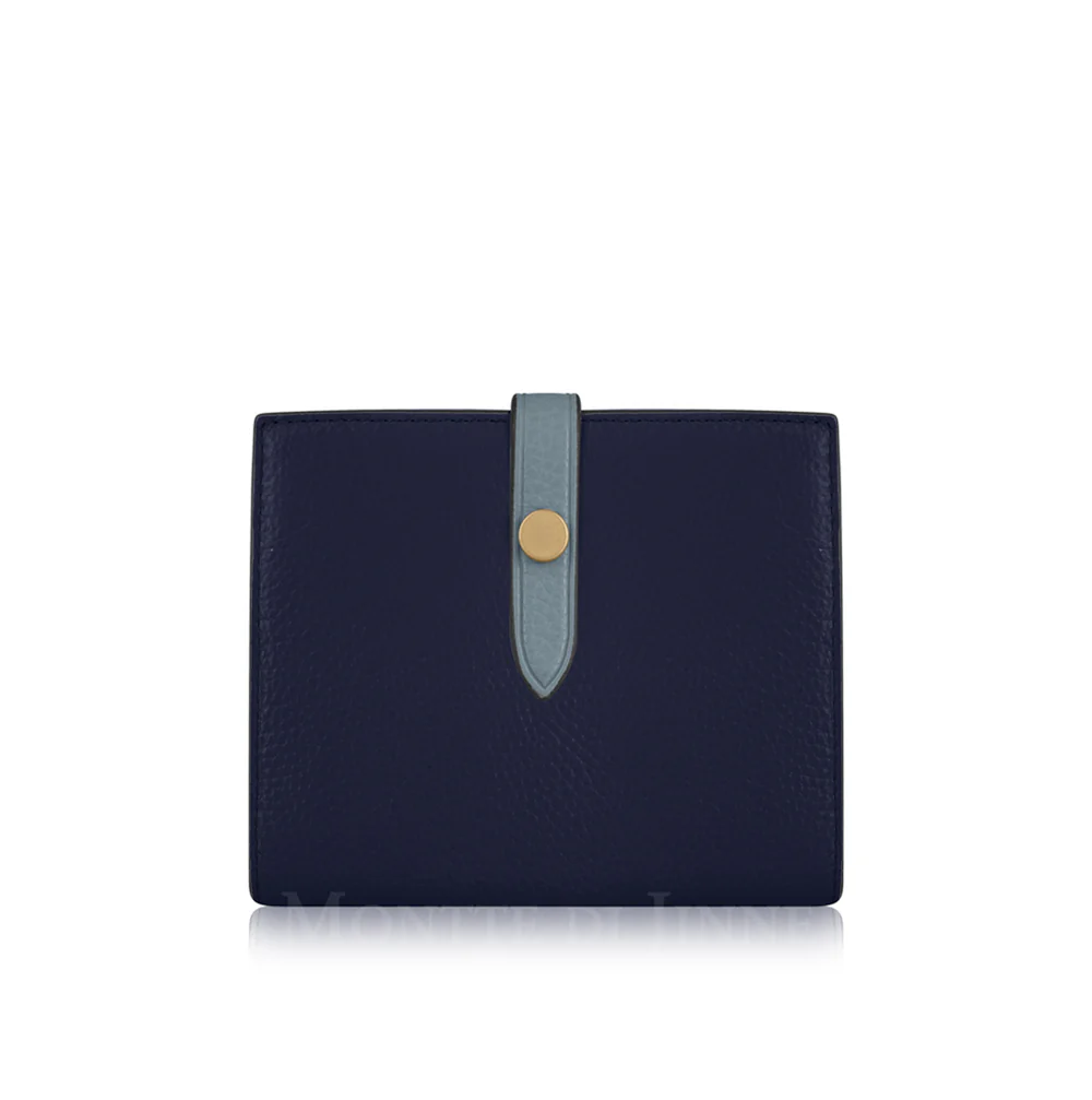 Exterior hero (Navy/Pale Blue): Navy and pale blue Italian leather compact bi-fold wallet with contrasting tab closure, handmade in Italy | MERLEORA